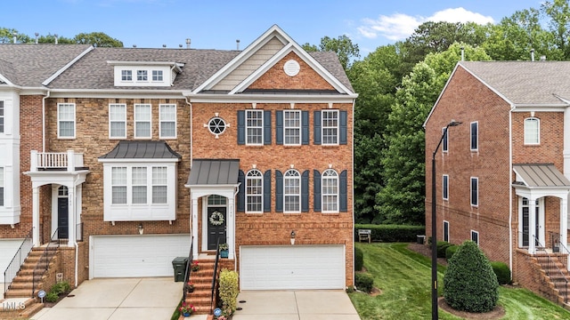 2740 Laurelcherry St, Raleigh, NC 27612 - view of front of home with an attached garage, driveway, brick siding, and roof with shingles