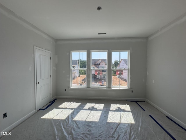 252 Meadowbark Bnd Unit 46, Garner, NC 27529 - carpeted empty room featuring baseboards