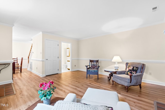 320 Summerwalk Cir, Chapel Hill, NC 27517 - living area featuring wood finished floors, ornamental molding, and baseboards
