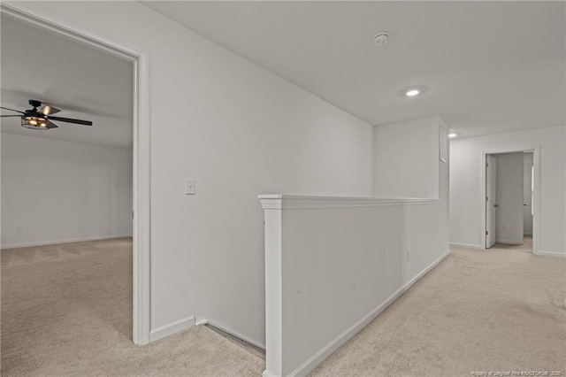 40 Arlie Ln, Lillington, NC 27546 - hallway with carpet, an upstairs landing, baseboards, and recessed lighting