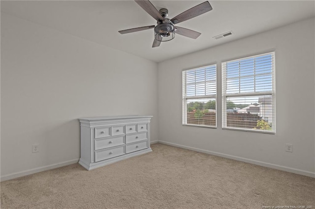 40 Arlie Ln, Lillington, NC 27546 - spare room with carpet, baseboards, and ceiling fan