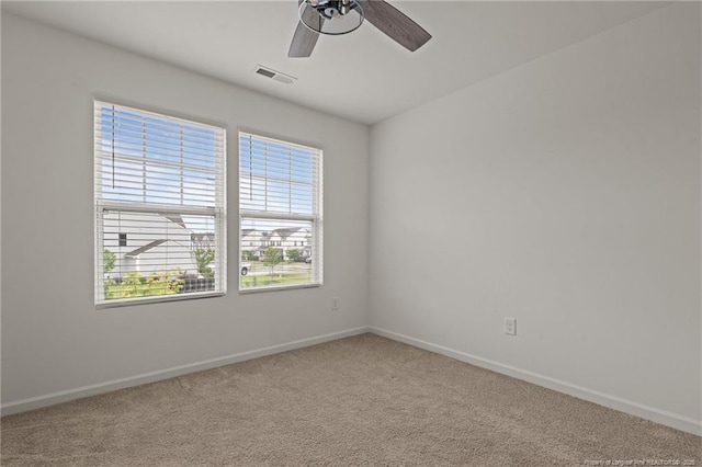 40 Arlie Ln, Lillington, NC 27546 - carpeted empty room with baseboards and a ceiling fan