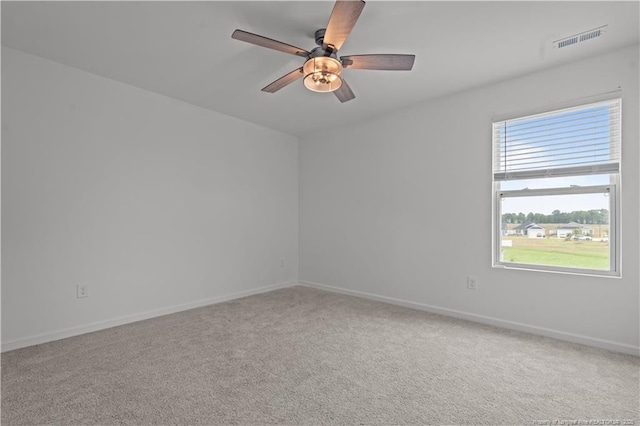 40 Arlie Ln, Lillington, NC 27546 - carpeted spare room with ceiling fan and baseboards