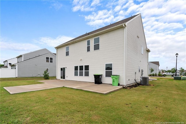 40 Arlie Ln, Lillington, NC 27546 - back of property featuring a patio area, a yard, and cooling unit