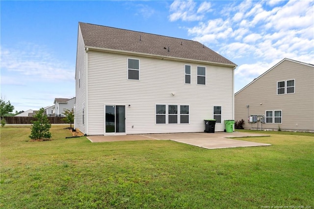 40 Arlie Ln, Lillington, NC 27546 - back of property featuring a patio and a lawn