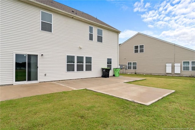 40 Arlie Ln, Lillington, NC 27546 - rear view of house with a patio and a yard