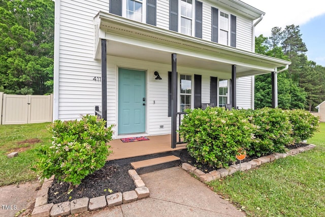 411 Buxton St, Durham, NC 27713 - doorway to property featuring a porch and a gate