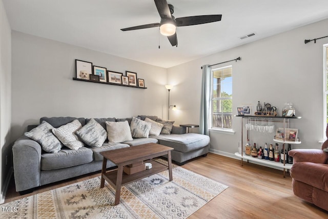 411 Buxton St, Durham, NC 27713 - living area with a ceiling fan and light wood-style floors
