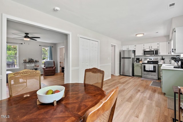 411 Buxton St, Durham, NC 27713 - dining room featuring light wood-type flooring and ceiling fan