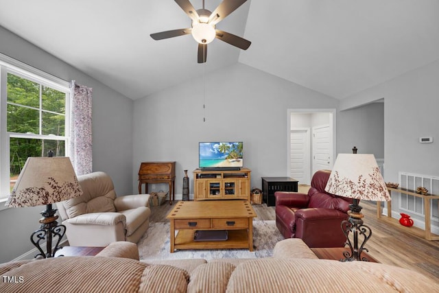 50 Harriet Gentry Ln, Timberlake, NC 27583 - living area featuring a ceiling fan, wood finished floors, and vaulted ceiling