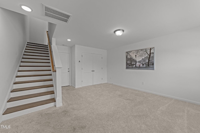 447 N Fisher St, Raleigh, NC 27610 - stairway with carpet flooring, baseboards, and recessed lighting