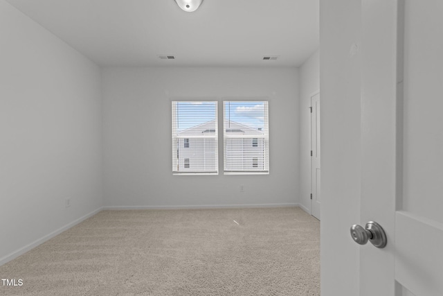 447 N Fisher St, Raleigh, NC 27610 - carpeted empty room featuring baseboards