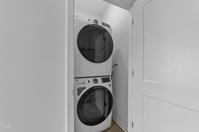 447 N Fisher St, Raleigh, NC 27610 - washroom with stacked washer / drying machine and baseboards