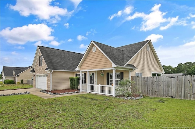 120 Wood Valley Ln, Raeford, NC 29376 - traditional-style home with covered porch, concrete driveway, roof with shingles, and brick siding