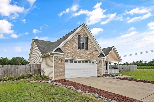 120 Wood Valley Ln, Raeford, NC 29376 - traditional home with an attached garage, brick siding, concrete driveway, and a shingled roof