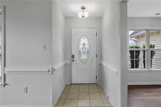120 Wood Valley Ln, Raeford, NC 29376 - entryway featuring a textured ceiling and baseboards