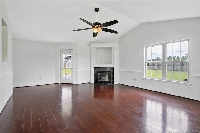 120 Wood Valley Ln, Raeford, NC 29376 - unfurnished living room with wood finished floors, lofted ceiling, a ceiling fan, a fireplace, and baseboards
