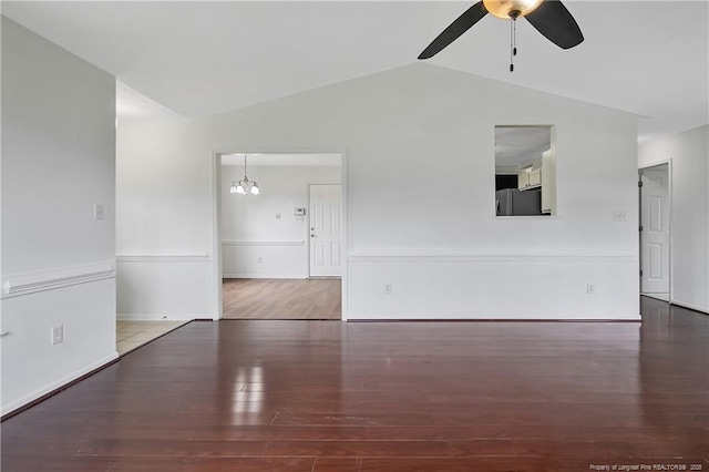 120 Wood Valley Ln, Raeford, NC 29376 - unfurnished room with a ceiling fan, a chandelier, vaulted ceiling, wood finished floors, and baseboards