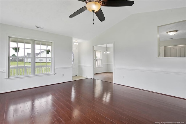 120 Wood Valley Ln, Raeford, NC 29376 - empty room featuring vaulted ceiling, ceiling fan, wood finished floors, a chandelier, and baseboards