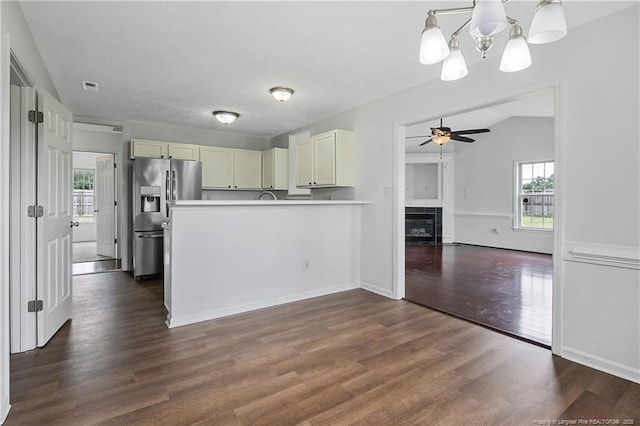 120 Wood Valley Ln, Raeford, NC 29376 - kitchen featuring stainless steel fridge with ice dispenser, plenty of natural light, a chandelier, a ceiling fan, and lofted ceiling