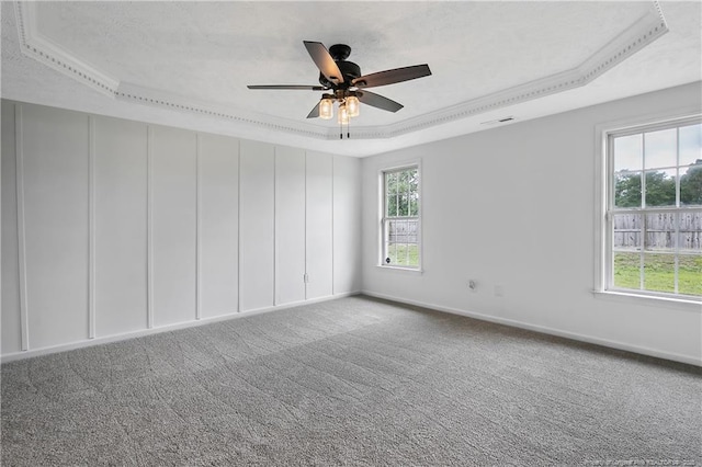 120 Wood Valley Ln, Raeford, NC 29376 - carpeted empty room with a raised ceiling, a ceiling fan, and baseboards