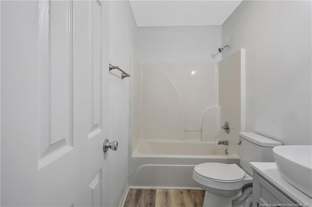 120 Wood Valley Ln, Raeford, NC 29376 - full bath with toilet, vanity, wood finished floors, and tub / shower combination