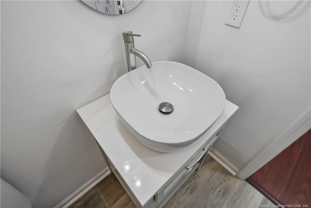 120 Wood Valley Ln, Raeford, NC 29376 - bathroom view of wood finished floors and a sink