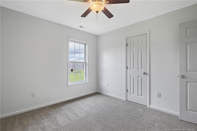 120 Wood Valley Ln, Raeford, NC 29376 - unfurnished bedroom with carpet floors, baseboards, and a ceiling fan