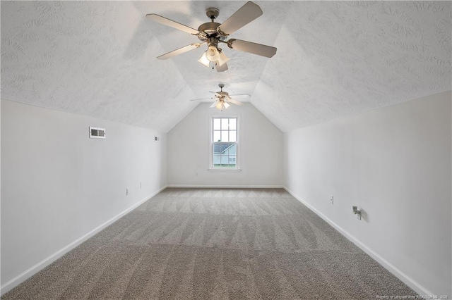 120 Wood Valley Ln, Raeford, NC 29376 - bonus room featuring a textured ceiling, baseboards, carpet flooring, lofted ceiling, and ceiling fan
