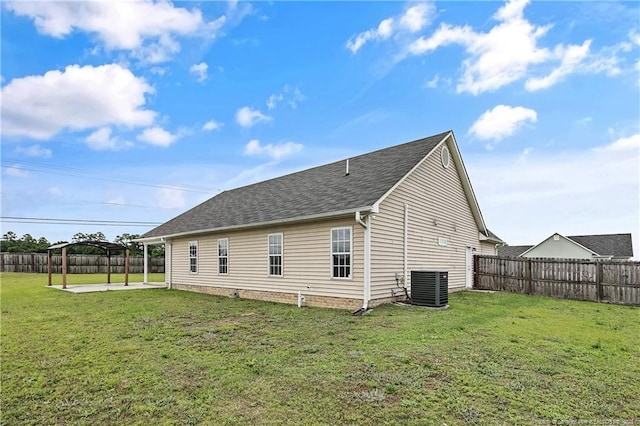 120 Wood Valley Ln, Raeford, NC 29376 - back of house featuring central AC, a gazebo, a patio, and a shingled roof