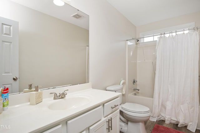 930 Pristine Ln, Rolesville, NC 27571 - full bathroom featuring vanity, wood finished floors, shower / bath combo, and toilet