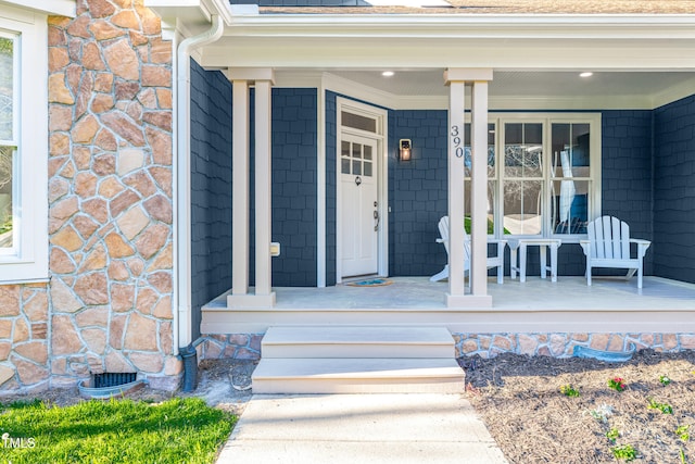 390 Lake Magnolia Way, Smithfield, NC 27577 - doorway to property featuring covered porch