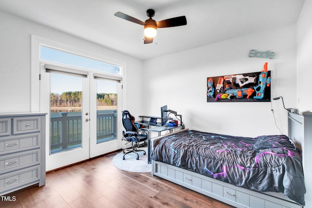 390 Lake Magnolia Way, Smithfield, NC 27577 - bedroom with french doors, access to exterior, wood finished floors, and ceiling fan
