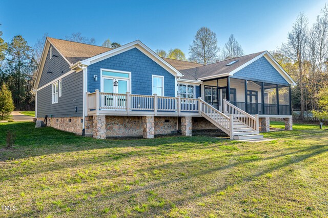390 Lake Magnolia Way, Smithfield, NC 27577 - rear view of property with a sunroom, a lawn, a shingled roof, and stairway