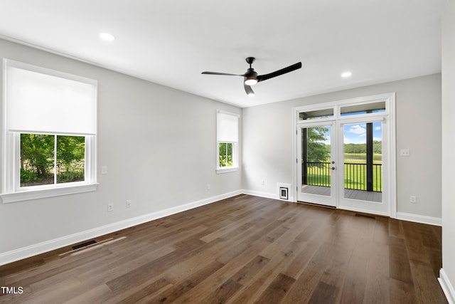 390 Lake Magnolia Way, Smithfield, NC 27577 - empty room with baseboards, dark wood-style floors, a ceiling fan, and recessed lighting
