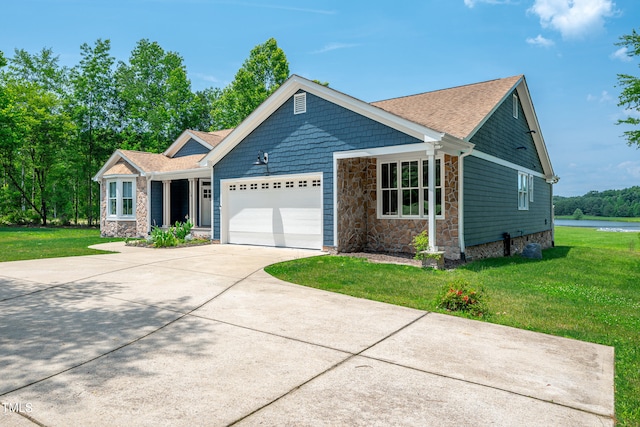 390 Lake Magnolia Way, Smithfield, NC 27577 - ranch-style home featuring stone siding, a garage, concrete driveway, and a front yard