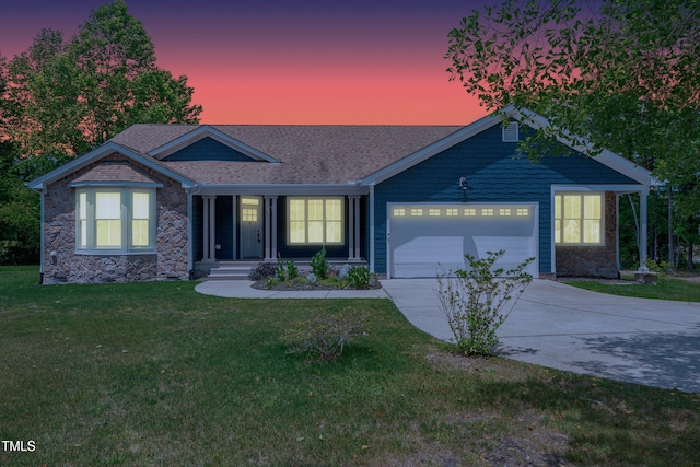 390 Lake Magnolia Way, Smithfield, NC 27577 - ranch-style home featuring stone siding, driveway, a front yard, an attached garage, and a shingled roof