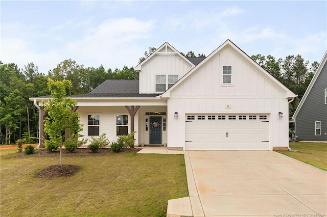 25 Vast View Way, Youngsville, NC 27596 - view of front of home with board and batten siding, a front yard, and concrete driveway
