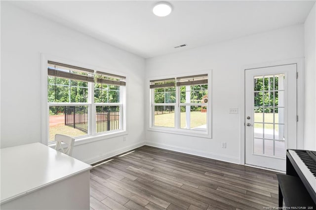25 Vast View Way, Youngsville, NC 27596 - unfurnished dining area with dark wood-style flooring, baseboards, and a desk