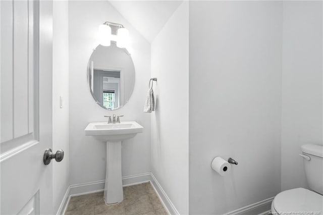 25 Vast View Way, Youngsville, NC 27596 - half bath featuring toilet, lofted ceiling, and baseboards