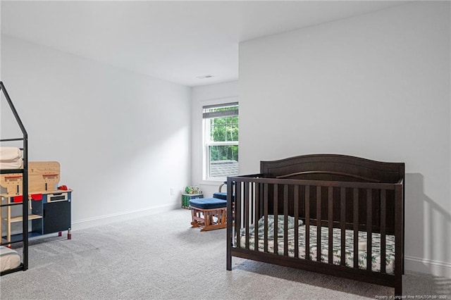 25 Vast View Way, Youngsville, NC 27596 - bedroom with carpet flooring, baseboards, and a crib