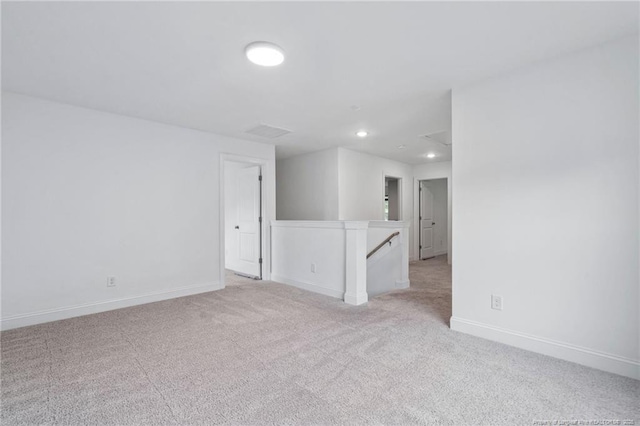 25 Vast View Way, Youngsville, NC 27596 - spare room with light carpet, baseboards, and recessed lighting