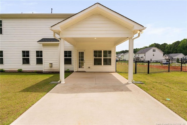 25 Vast View Way, Youngsville, NC 27596 - back of house with a carport, driveway, and a patio
