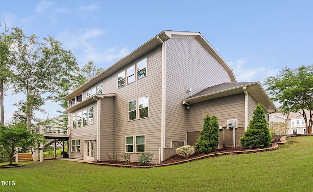 728 Peninsula Forest Pl, Cary, NC 27519 - rear view of property with a deck and a yard