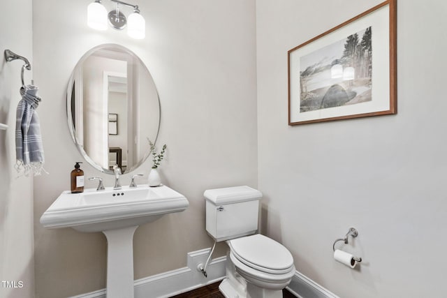 728 Peninsula Forest Pl, Cary, NC 27519 - bathroom with toilet and baseboards