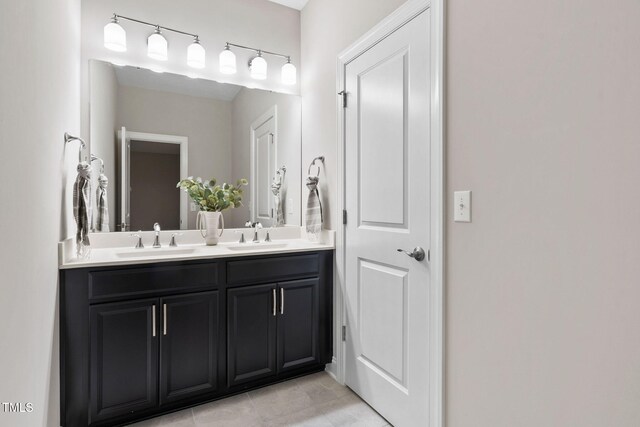 728 Peninsula Forest Pl, Cary, NC 27519 - bathroom featuring double vanity and tile patterned flooring
