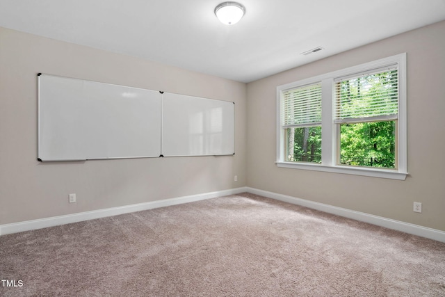 728 Peninsula Forest Pl, Cary, NC 27519 - carpeted spare room featuring baseboards