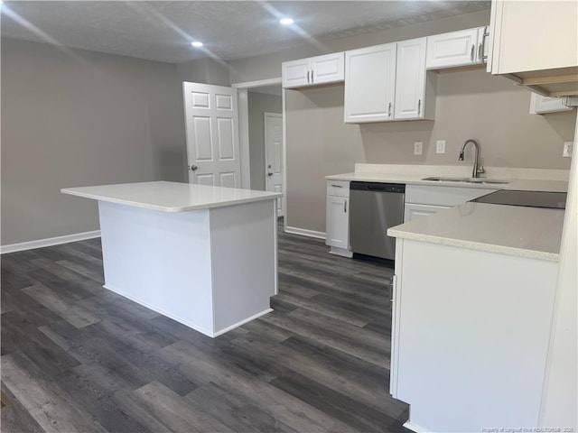 2903 Peacock St, Hope Mills, NC 28348 - kitchen featuring stainless steel dishwasher, a sink, white cabinetry, dark wood-style floors, and recessed lighting