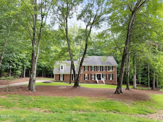 221 Jansmith Ln, Raleigh, NC 27615 - colonial home with brick siding