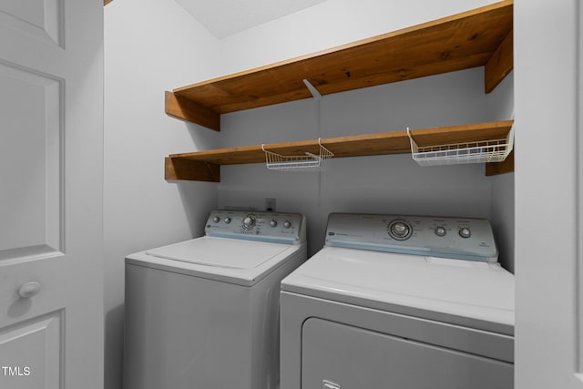 221 Jansmith Ln, Raleigh, NC 27615 - laundry area with washing machine and clothes dryer
